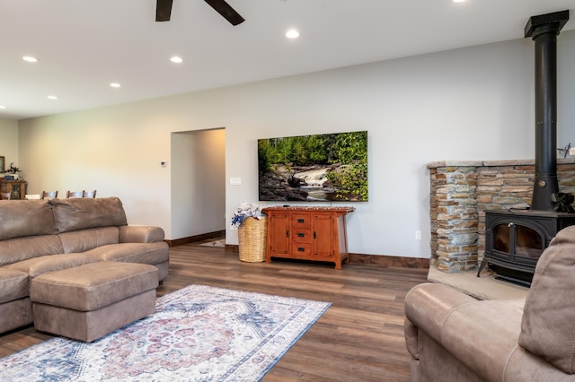 7170 29th Ave SW, Pequot Lakes, MN 56472 - living area with a wood stove, a ceiling fan, wood finished floors, and recessed lighting