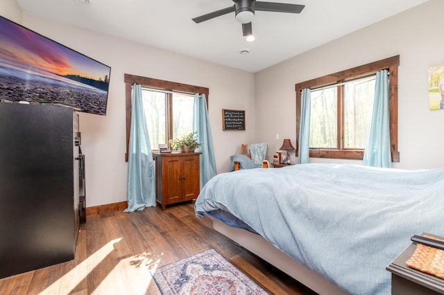 7170 29th Ave SW, Pequot Lakes, MN 56472 - bedroom with wood finished floors and a ceiling fan