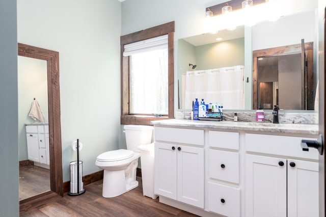 7170 29th Ave SW, Pequot Lakes, MN 56472 - full bathroom featuring vanity, wood finished floors, and a shower with curtain