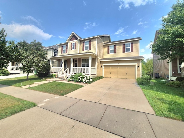 15850 Elmwood Ln, Apple Valley, MN 55124 - traditional-style house with covered porch, concrete driveway, an attached garage, and a front lawn