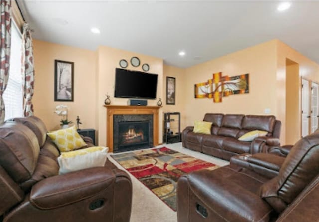 15850 Elmwood Ln, Apple Valley, MN 55124 - living area with carpet floors, a glass covered fireplace, and recessed lighting