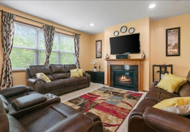 15850 Elmwood Ln, Apple Valley, MN 55124 - carpeted living area with a fireplace with flush hearth and recessed lighting