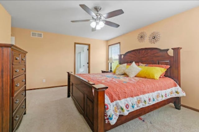 15850 Elmwood Ln, Apple Valley, MN 55124 - bedroom with light colored carpet and a ceiling fan