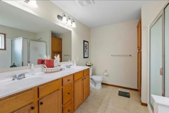 15850 Elmwood Ln, Apple Valley, MN 55124 - full bath with a shower stall, double vanity, and tile patterned flooring
