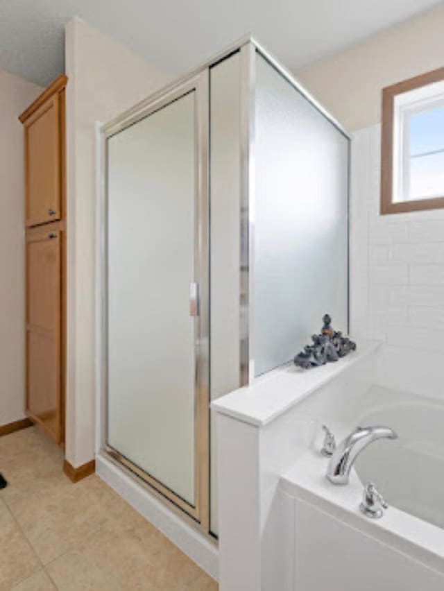 15850 Elmwood Ln, Apple Valley, MN 55124 - full bath with a stall shower and a garden tub