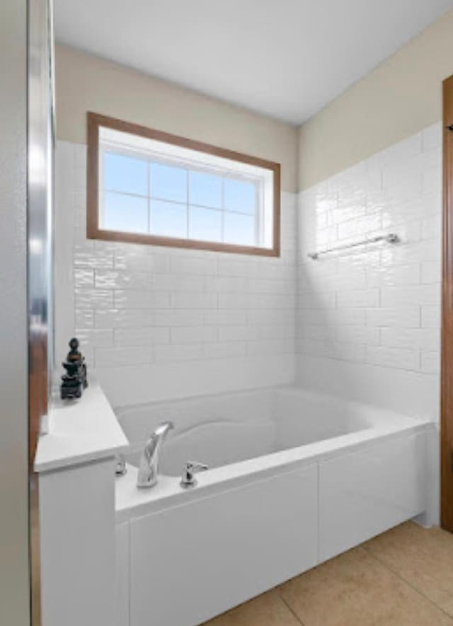 15850 Elmwood Ln, Apple Valley, MN 55124 - full bath with a tub, tile patterned floors, and vanity