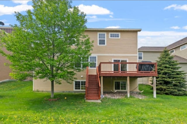 15850 Elmwood Ln, Apple Valley, MN 55124 - back of property featuring stairway, a deck, and a yard