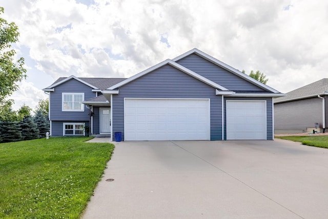 1280 Lone Stone Ct SE, Chatfield, MN 55923 - view of front of house featuring concrete driveway, a front lawn, and a garage