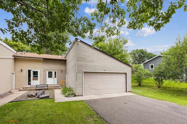 11716 54th St NE, Albertville, MN 55301 - mid-century home with a front yard, an attached garage, and driveway