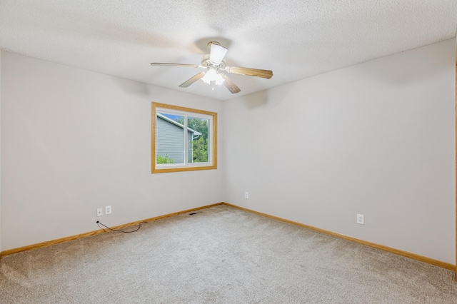 11716 54th St NE, Albertville, MN 55301 - spare room with carpet flooring, a ceiling fan, and a textured ceiling