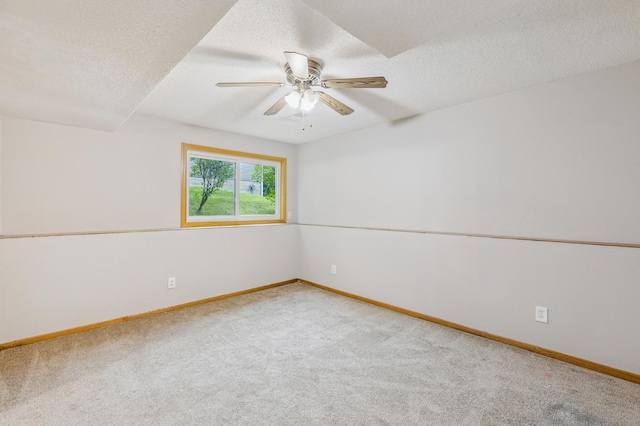 11716 54th St NE, Albertville, MN 55301 - spare room with carpet flooring, a textured ceiling, and ceiling fan
