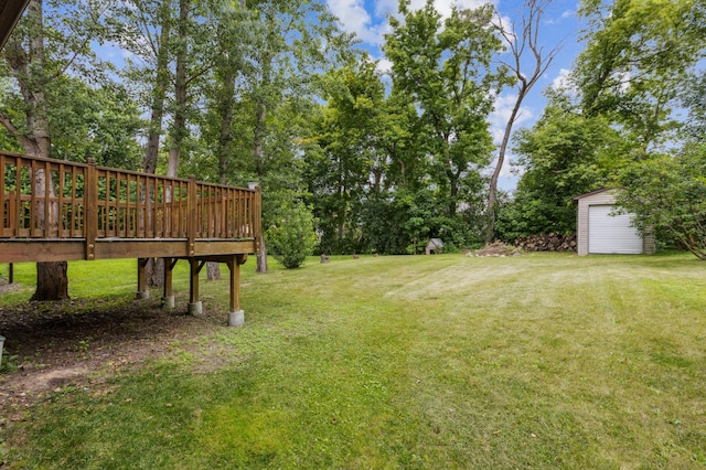 11716 54th St NE, Albertville, MN 55301 - view of green lawn featuring a storage unit and a wooden deck
