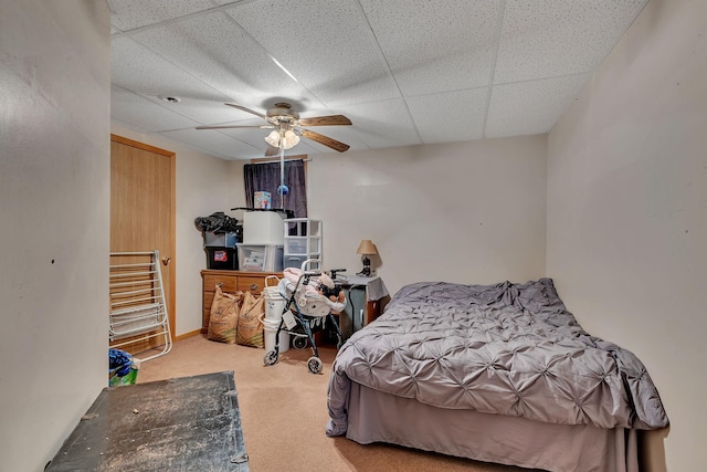 43054 105th Ave, Brockway Twp, MN 56367 - bedroom with carpet floors, a paneled ceiling, and ceiling fan