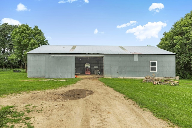 43054 105th Ave, Brockway Twp, MN 56367 - view of pole building featuring a yard and driveway