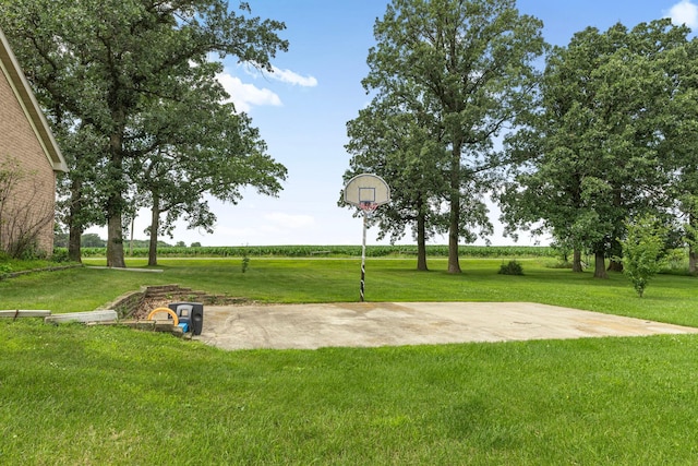 43054 105th Ave, Brockway Twp, MN 56367 - view of sport court featuring basketball court and a lawn