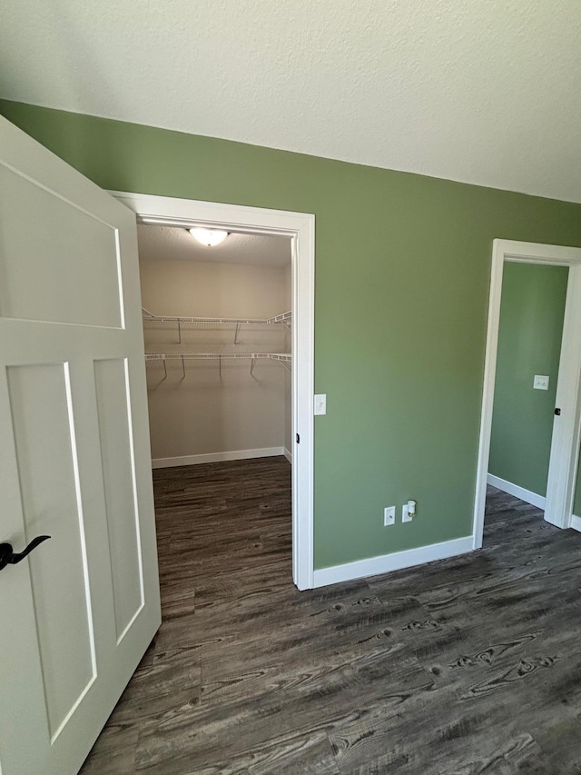 2032 Reuss Pkwy, Saint Croix Falls, WI 54024 - spacious closet with dark wood-type flooring