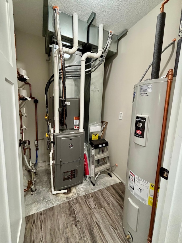 2032 Reuss Pkwy, Saint Croix Falls, WI 54024 - utility room featuring electric water heater