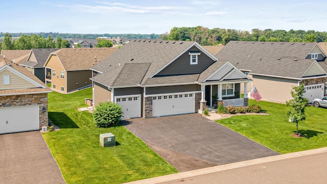 19621 115th Ave N, Rogers, MN 55311 - craftsman inspired home featuring a porch, roof with shingles, asphalt driveway, stone siding, and a residential view