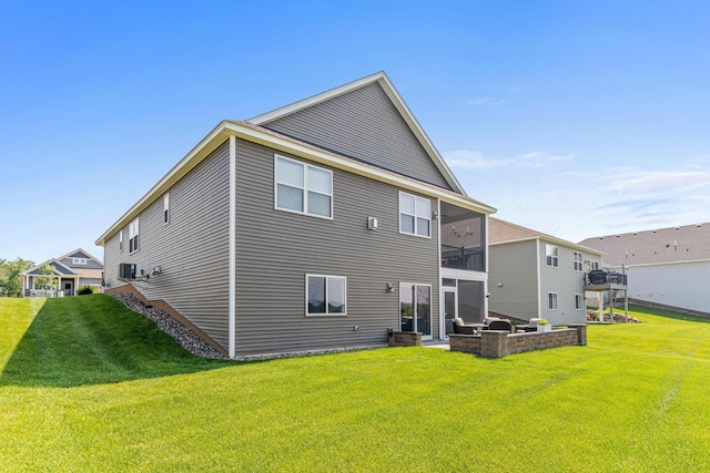 19621 115th Ave N, Rogers, MN 55311 - back of house featuring a yard, a sunroom, and a patio area
