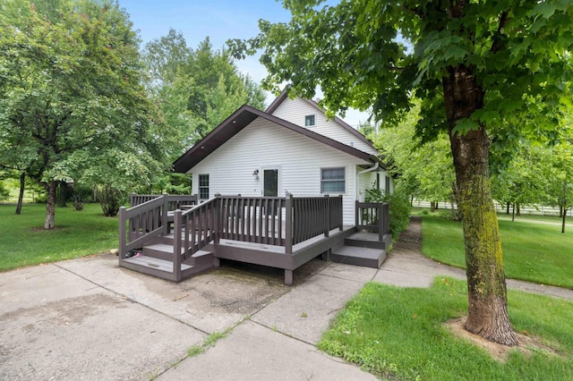 12639 65th Ave SW, May Twp, MN 56466 - view of front facade featuring a front yard and a wooden deck