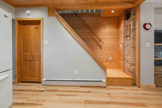 12639 65th Ave SW, May Twp, MN 56466 - unfurnished living room featuring a baseboard radiator, wood finished floors, and recessed lighting