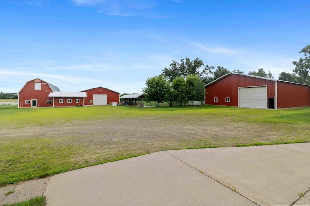 12639 65th Ave SW, May Twp, MN 56466 - view of yard featuring a detached garage, an outdoor structure, and a pole building