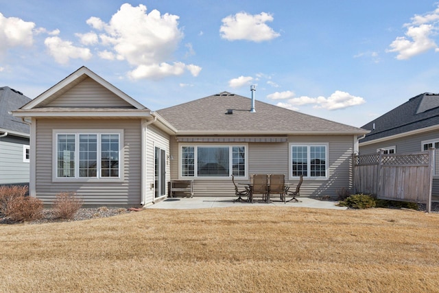 7461 Fir Ln N, Corcoran, MN 55340 - rear view of house with a patio and a shingled roof