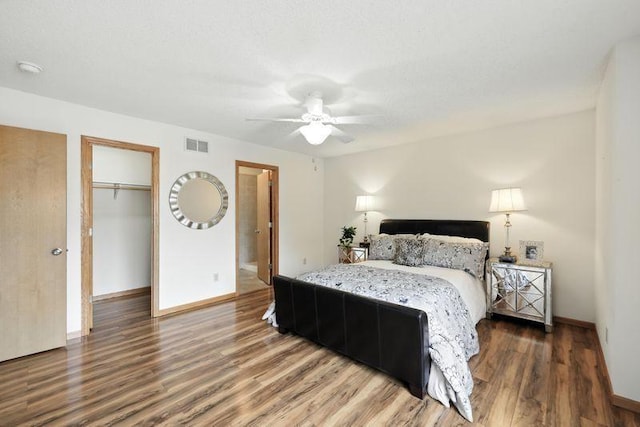 5460 100th Ln N, Brooklyn Park, MN 55443 - bedroom featuring wood finished floors and ceiling fan
