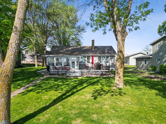 44042 Outlet Beach Rd, Lida Twp, MN 56572 - back of property featuring a chimney, a lawn, and a patio