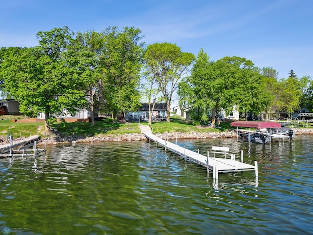 44042 Outlet Beach Rd, Lida Twp, MN 56572 - dock with boat lift and a water view