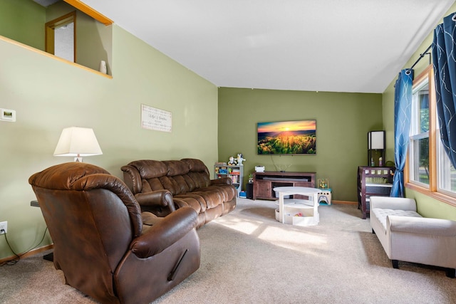 10919 Eagle St NW, Coon Rapids, MN 55433 - carpeted living room with baseboards and vaulted ceiling