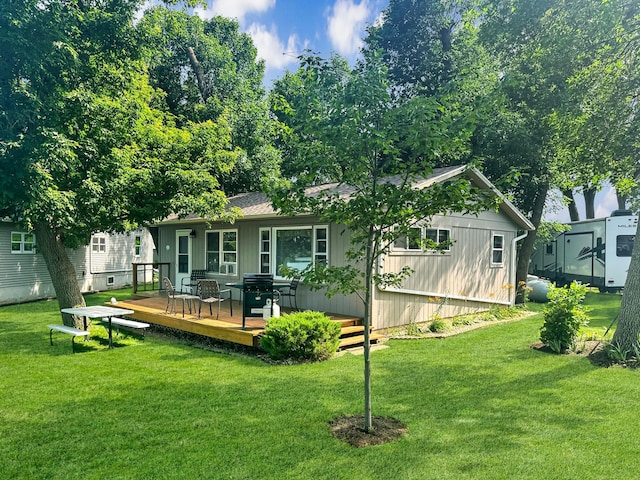 50 Shady Rest Rd, Lake Sarah Twp, MN 56132 - back of property with a deck and a lawn