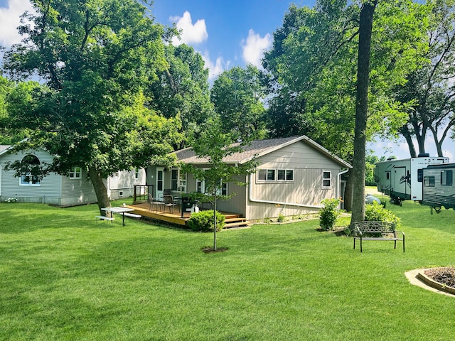 50 Shady Rest Rd, Lake Sarah Twp, MN 56132 - rear view of property featuring a deck and a yard