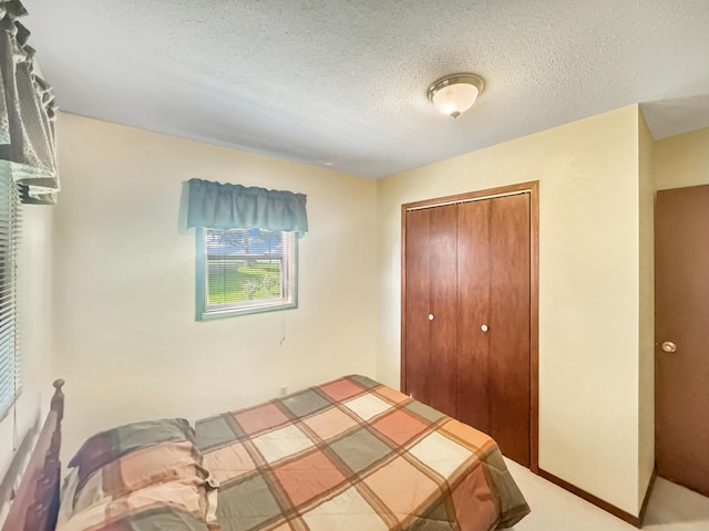 50 Shady Rest Rd, Lake Sarah Twp, MN 56132 - bedroom featuring a closet and a textured ceiling