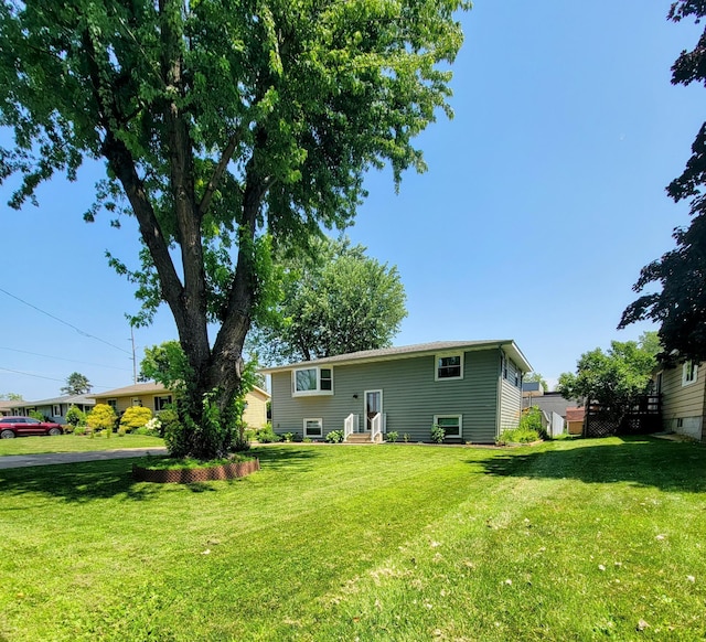 619 3rd St NW, Forest Lake, MN 55025 - back of property featuring a yard