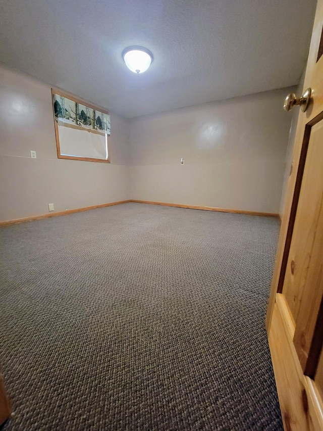 619 3rd St NW, Forest Lake, MN 55025 - carpeted spare room with baseboards