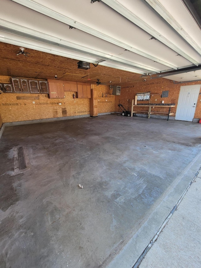 619 3rd St NW, Forest Lake, MN 55025 - garage featuring a garage door opener
