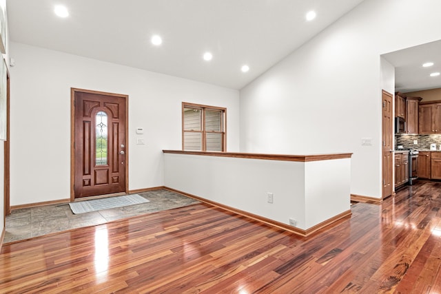 12605 314th St, Lindstrom, MN 55045 - entryway with dark wood finished floors, recessed lighting, and high vaulted ceiling