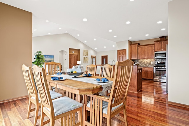12605 314th St, Lindstrom, MN 55045 - dining area with light wood finished floors, recessed lighting, and vaulted ceiling