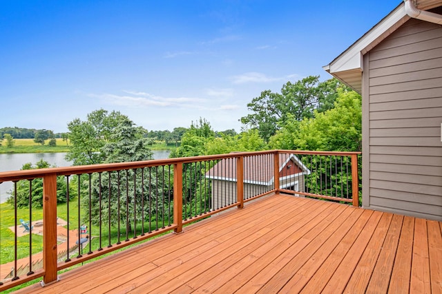 12605 314th St, Lindstrom, MN 55045 - wooden deck featuring a water view and view of scattered trees