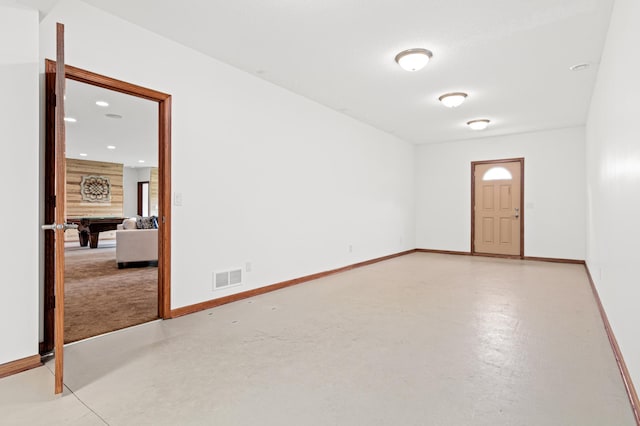 12605 314th St, Lindstrom, MN 55045 - empty room featuring finished concrete flooring, recessed lighting, and billiards table