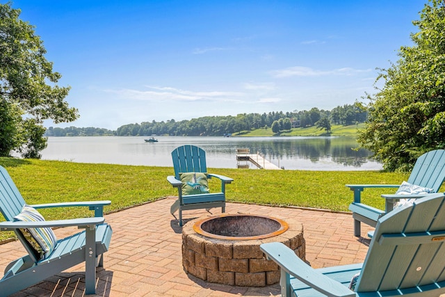 12605 314th St, Lindstrom, MN 55045 - view of patio / terrace with an outdoor fire pit and a water view
