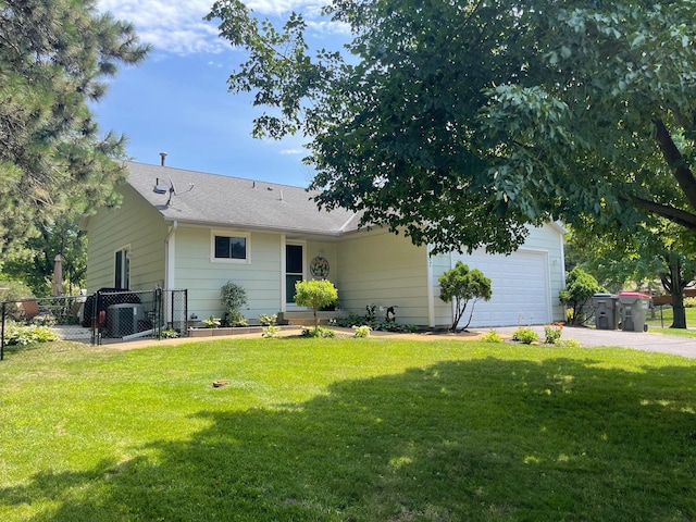 15607 Kumquat St NW, Andover, MN 55304 - view of front facade with an attached garage and asphalt driveway