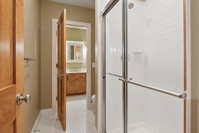 17244 Valley Rd, Eden Prairie, MN 55347 - full bath with a stall shower, vanity, and tile patterned flooring