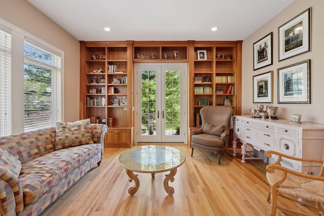 17244 Valley Rd, Eden Prairie, MN 55347 - sitting room with light wood-type flooring, french doors, recessed lighting, and built in shelves