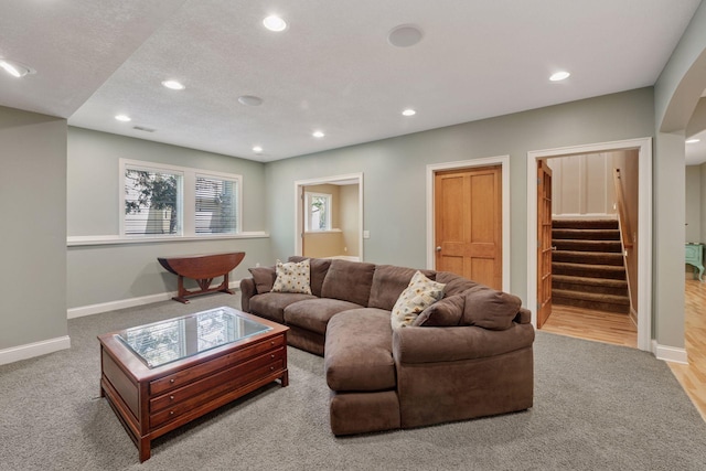 17244 Valley Rd, Eden Prairie, MN 55347 - carpeted living area featuring recessed lighting, healthy amount of natural light, and stairway
