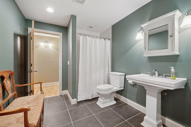 17244 Valley Rd, Eden Prairie, MN 55347 - full bathroom with tile patterned floors and a shower with shower curtain