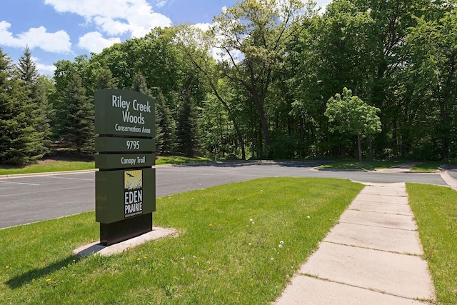 17244 Valley Rd, Eden Prairie, MN 55347 - view of road featuring sidewalks and a wooded view