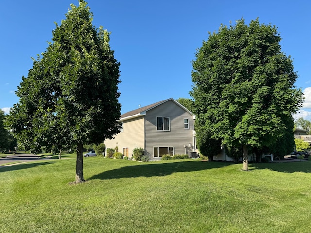 10539 56th St NE, Albertville, MN 55301 - view of property exterior with a yard