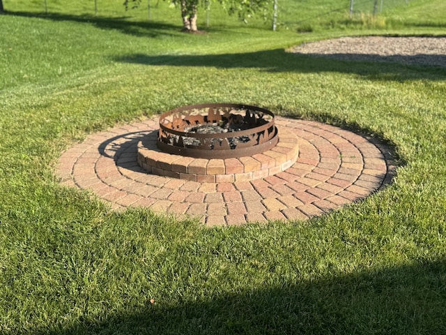 10539 56th St NE, Albertville, MN 55301 - view of green lawn featuring a fire pit